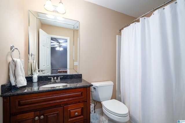 bathroom featuring toilet, vanity, and tile patterned floors