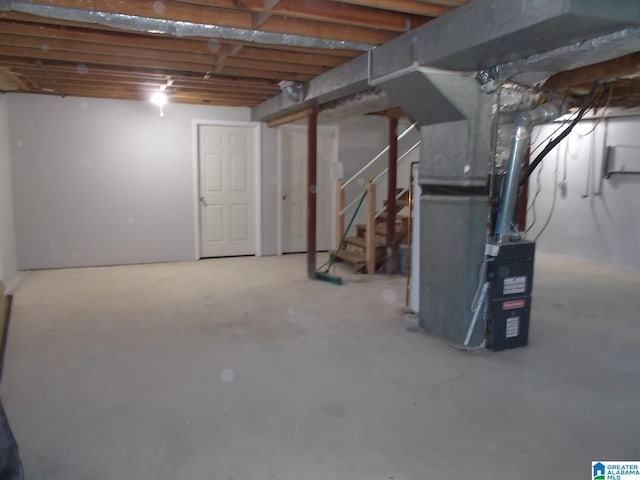 basement featuring heating unit