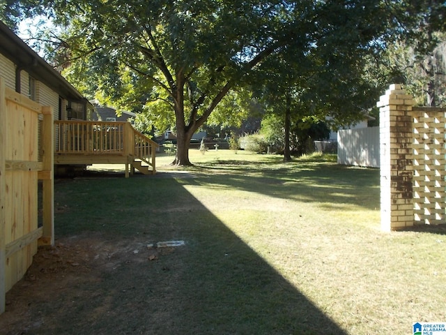 view of yard featuring a deck