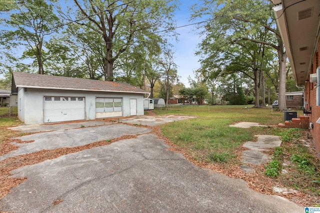 view of yard with a garage