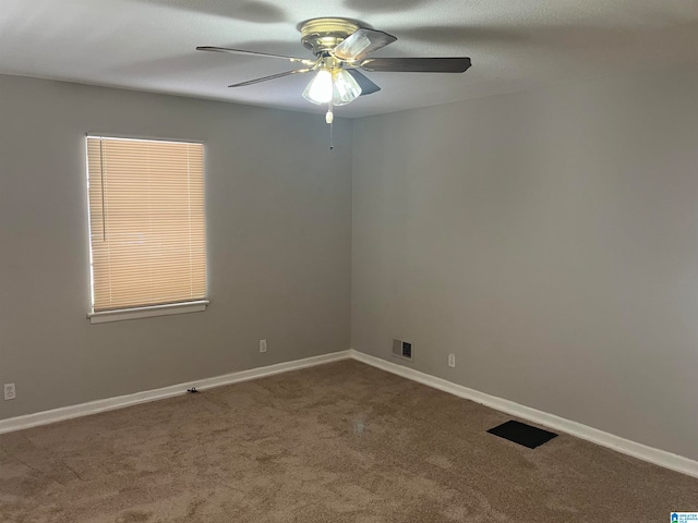 carpeted empty room with ceiling fan