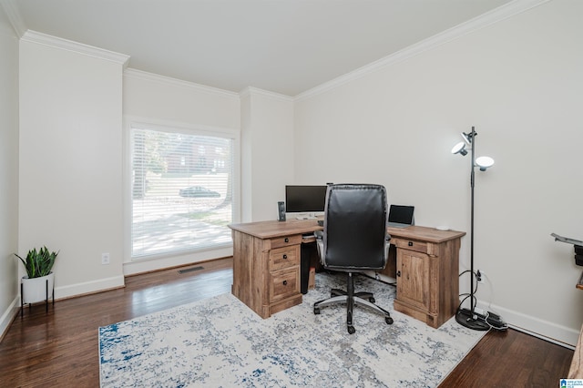 home office with ornamental molding and dark hardwood / wood-style floors