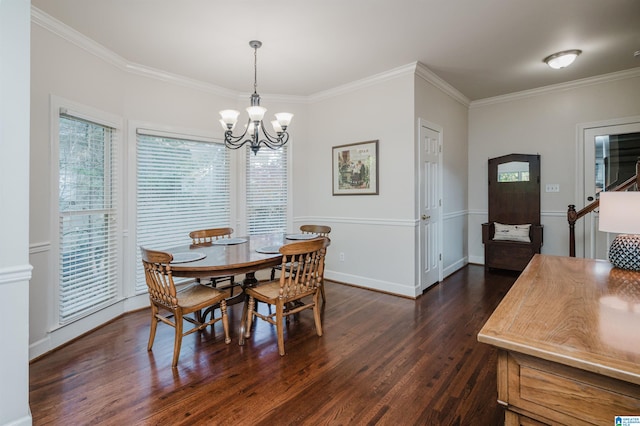 dining area with crown molding, a chandelier, and dark hardwood / wood-style flooring