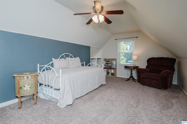 bedroom with lofted ceiling, light carpet, and ceiling fan