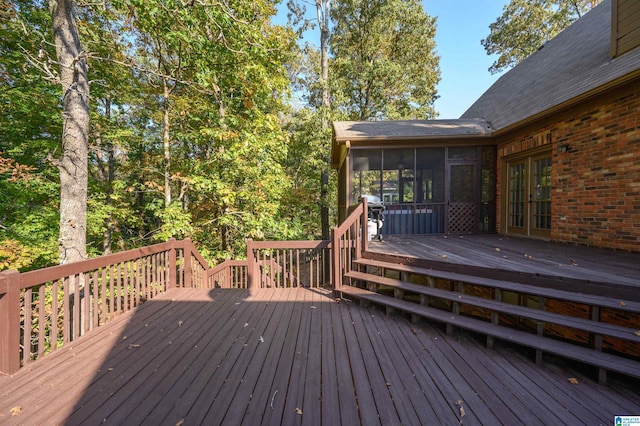 deck featuring a sunroom