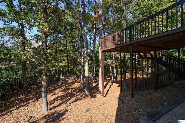 view of yard featuring a wooden deck