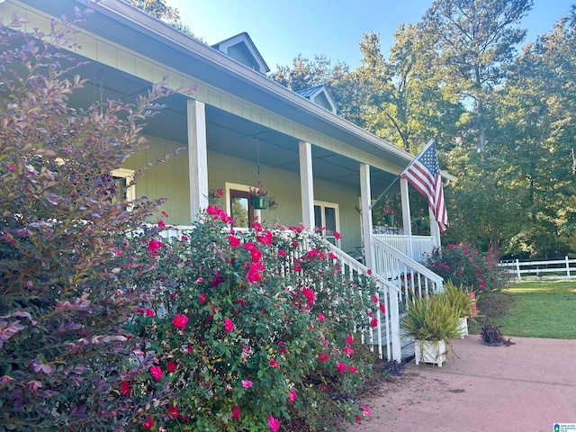 view of home's exterior with covered porch