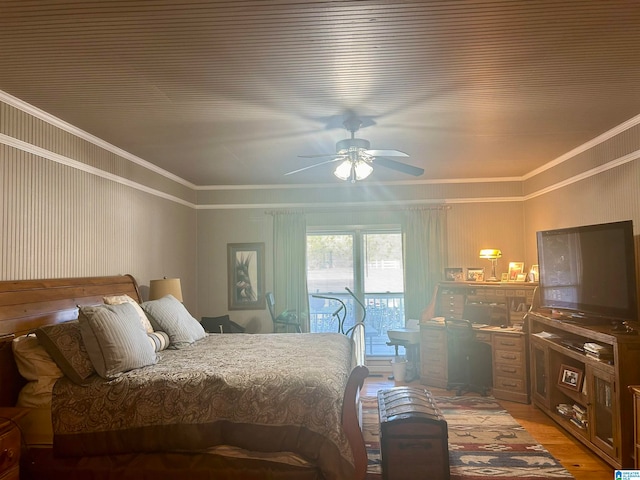 bedroom with ceiling fan, hardwood / wood-style flooring, and ornamental molding