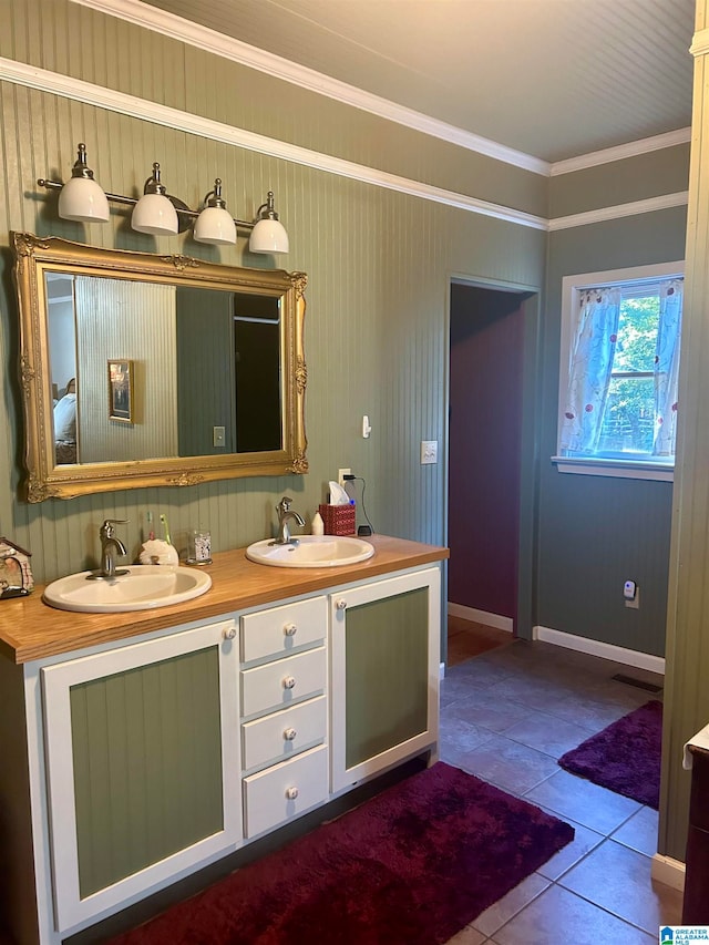 bathroom with vanity, tile patterned floors, and ornamental molding