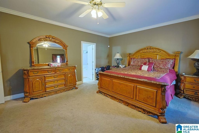 bedroom featuring crown molding, ensuite bath, light colored carpet, and ceiling fan