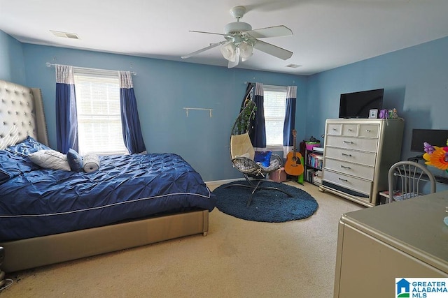 bedroom featuring carpet and ceiling fan