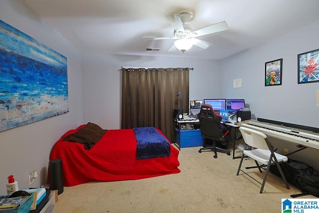 bedroom featuring ceiling fan and light colored carpet