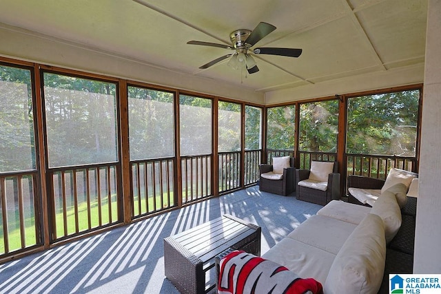 sunroom featuring a wealth of natural light and ceiling fan