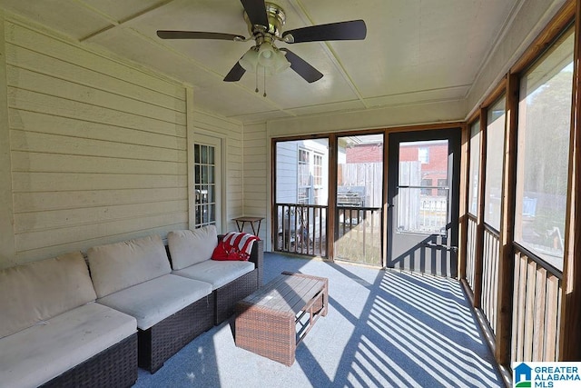 sunroom / solarium with ceiling fan