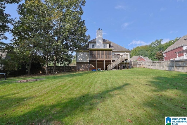 view of yard with a sunroom