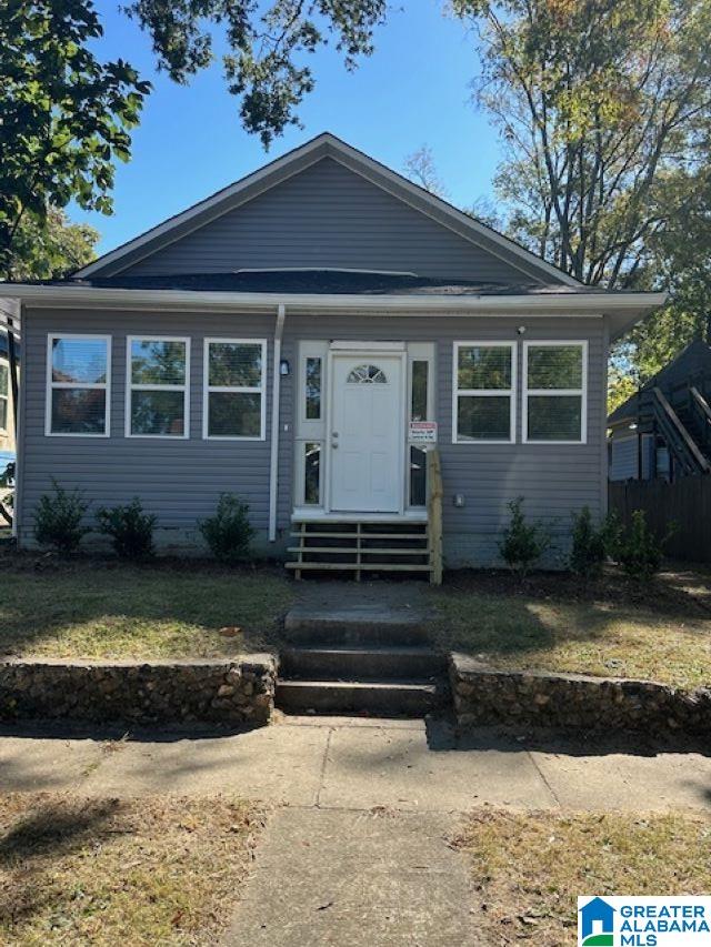 8321 Division Ave, Birmingham, AL 35206 - bungalow-style home featuring fence and entry steps