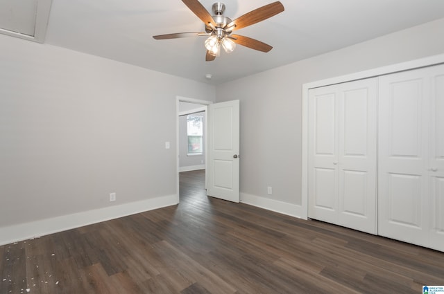 8321 Division Ave, Birmingham, AL 35206 - unfurnished bedroom featuring a closet, dark wood-style flooring, ceiling fan, and baseboards
