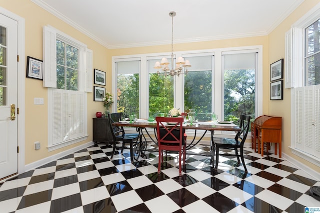 dining room featuring crown molding, a notable chandelier, tile patterned floors, and baseboards