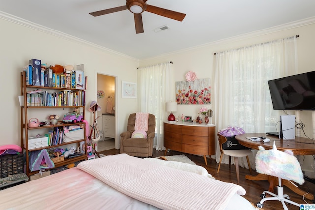 601 Hillyer High Rd, Anniston, AL 36207 - bedroom featuring connected bathroom, a ceiling fan, visible vents, ornamental molding, and wood finished floors