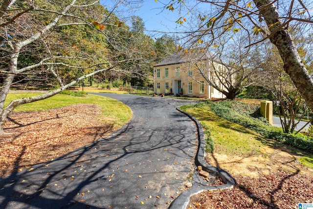 exterior space with stucco siding and driveway