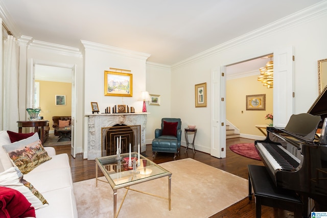 living room featuring dark wood-type flooring and ornamental molding