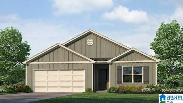 view of front of house featuring a garage and a front lawn