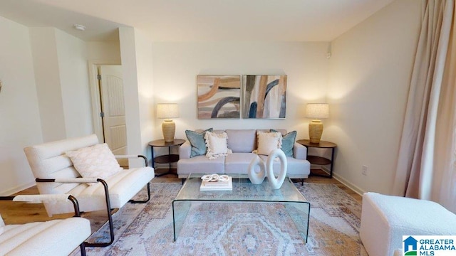 living room with light hardwood / wood-style flooring