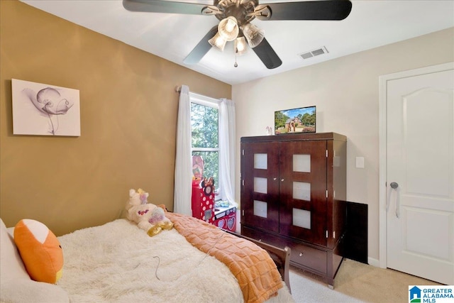 carpeted bedroom featuring ceiling fan