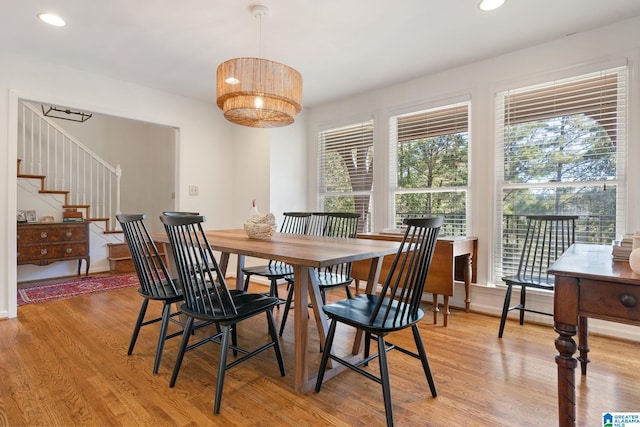 dining room with light hardwood / wood-style flooring