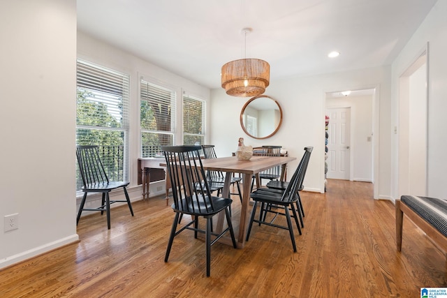 dining area featuring hardwood / wood-style flooring