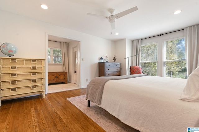 bedroom featuring ceiling fan and hardwood / wood-style floors