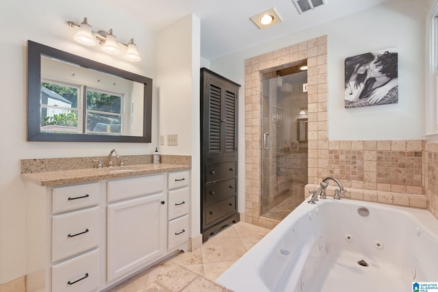 bathroom with vanity, independent shower and bath, and tile patterned floors