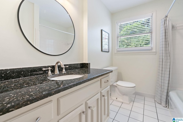 full bathroom with vanity, shower / bath combination with curtain, toilet, and tile patterned floors