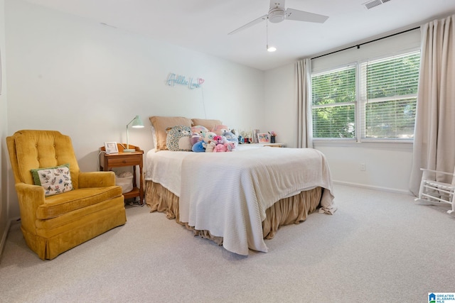 carpeted bedroom with ceiling fan