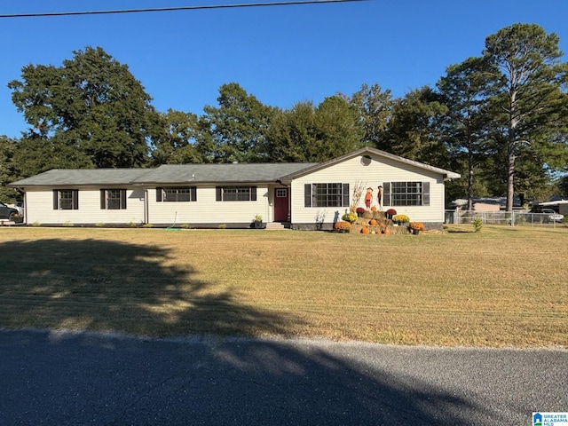 single story home with a front yard