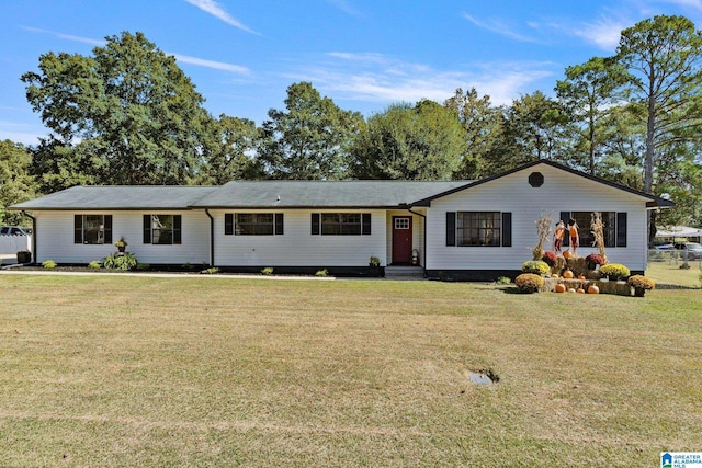 single story home featuring a front lawn