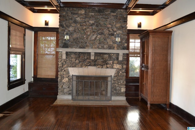 2705 Caldwell Ave S, Birmingham, AL 35205 - unfurnished living room featuring hardwood / wood-style floors, beamed ceiling, coffered ceiling, a fireplace, and baseboards