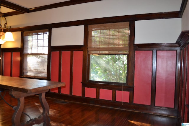 2705 Caldwell Ave S, Birmingham, AL 35205 - dining space with wood finished floors, healthy amount of natural light, and ornamental molding