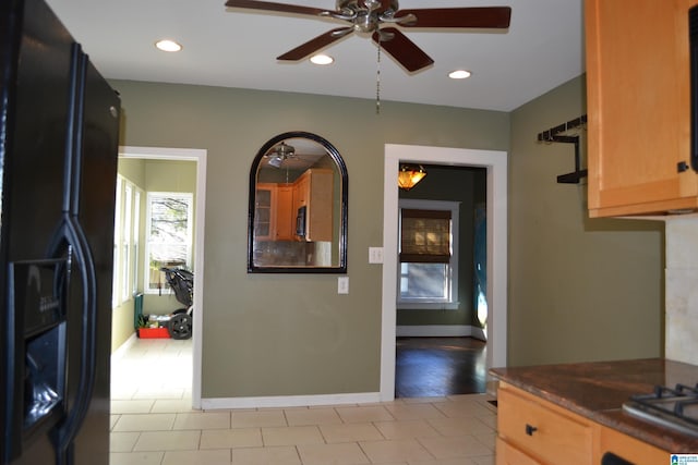 2705 Caldwell Ave S, Birmingham, AL 35205 - kitchen featuring black refrigerator with ice dispenser, a ceiling fan, dark countertops, recessed lighting, and baseboards