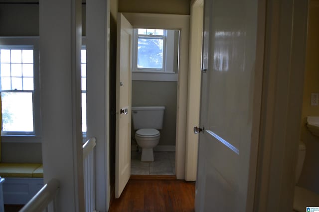 2705 Caldwell Ave S, Birmingham, AL 35205 - bathroom with toilet and wood finished floors