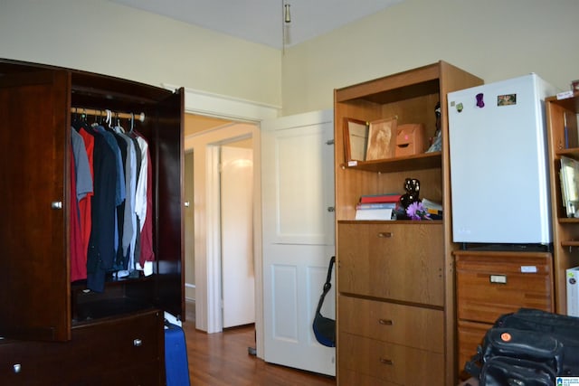 bedroom with wood-type flooring