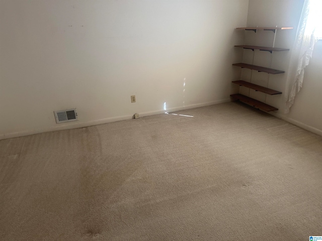 empty room featuring carpet floors