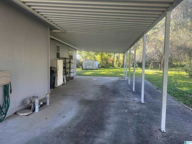 view of patio featuring a shed