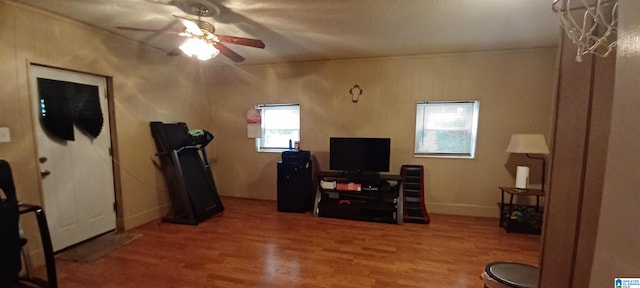 interior space featuring hardwood / wood-style flooring and ceiling fan