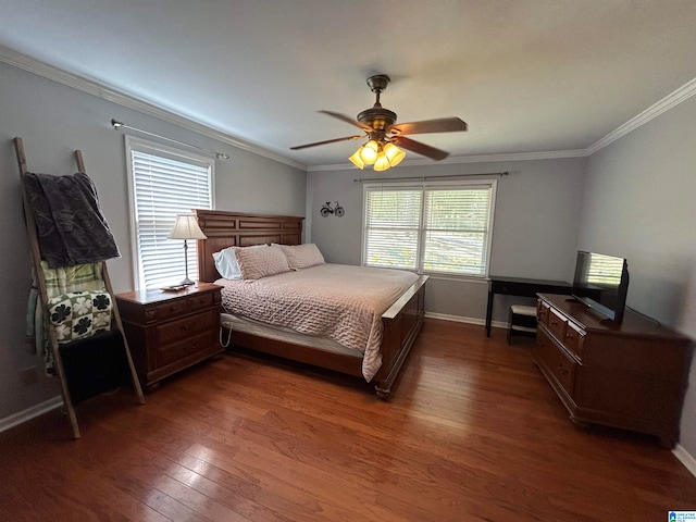 bedroom featuring ornamental molding, ceiling fan, multiple windows, and dark hardwood / wood-style flooring