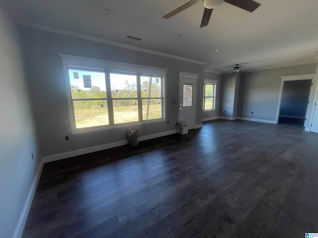 unfurnished living room featuring ceiling fan, dark hardwood / wood-style flooring, and crown molding