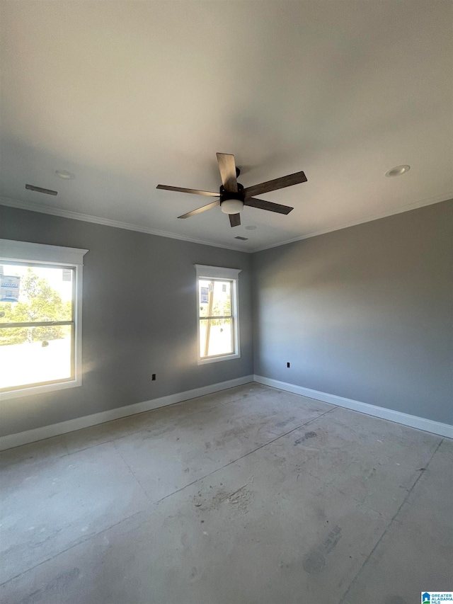 unfurnished room featuring ceiling fan and ornamental molding