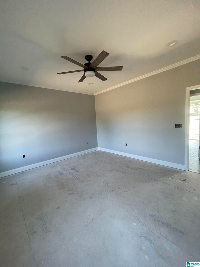 spare room with ceiling fan and ornamental molding