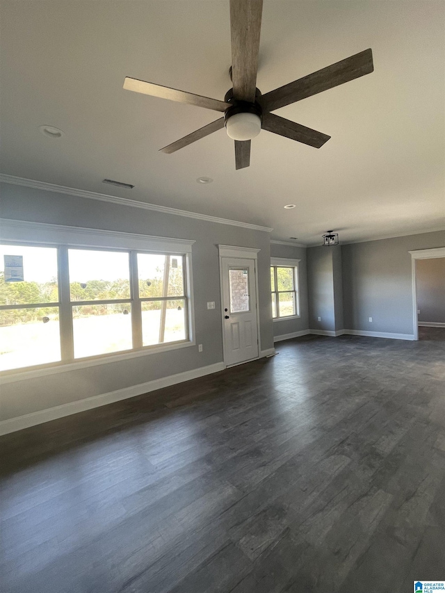 interior space with ceiling fan, dark hardwood / wood-style floors, and crown molding