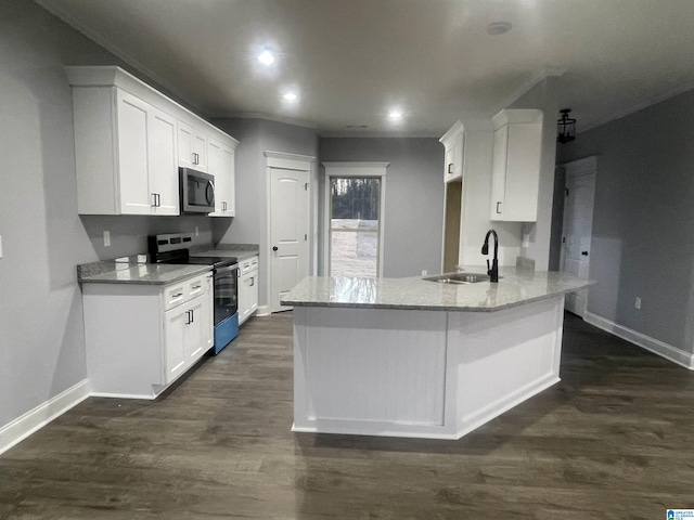 kitchen with appliances with stainless steel finishes, dark wood-type flooring, light stone countertops, white cabinets, and sink